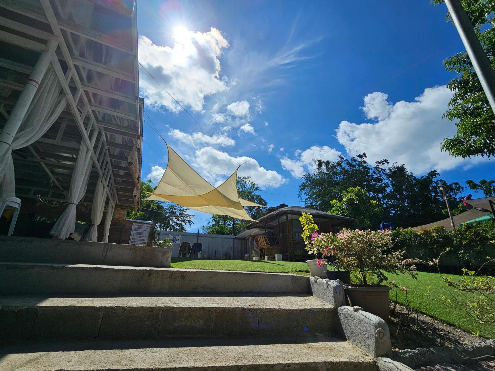 Mymi Beach House Hotel Samal Exterior photo